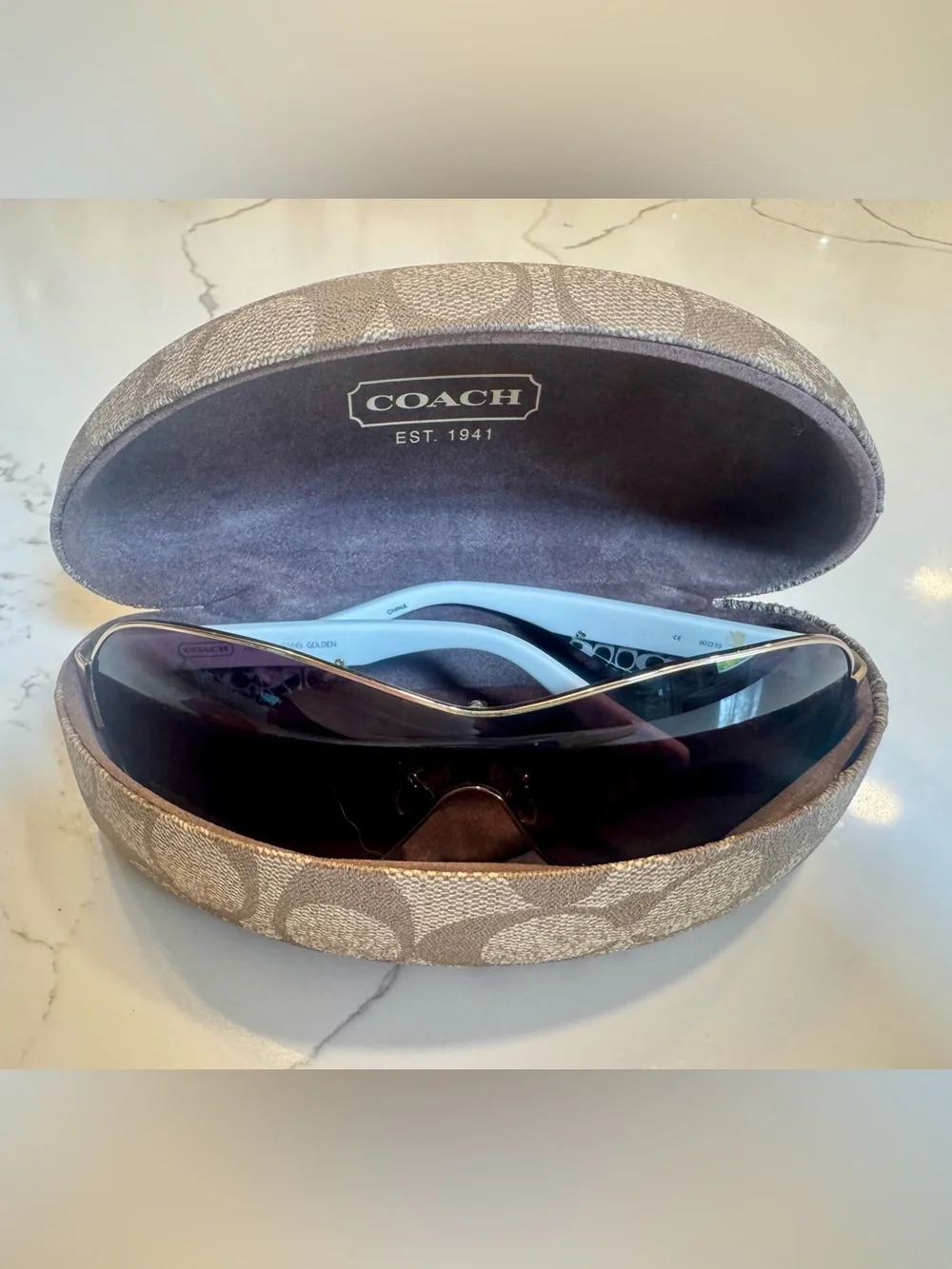 Women’s Coach Leanne S566 wrap golden sunglasses. White with signature C